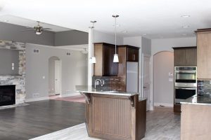 kitchen tile, hardwood floor, tile floor, 12"x24" tile, stacked stone, fireplace